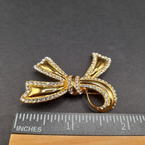 Vintage Monet Rhinestone Bow Brooch, Gold Plated, 1 1/2 Inches - Picture 8 of 9